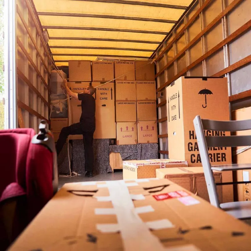 Moving truck with storage boxes packed in